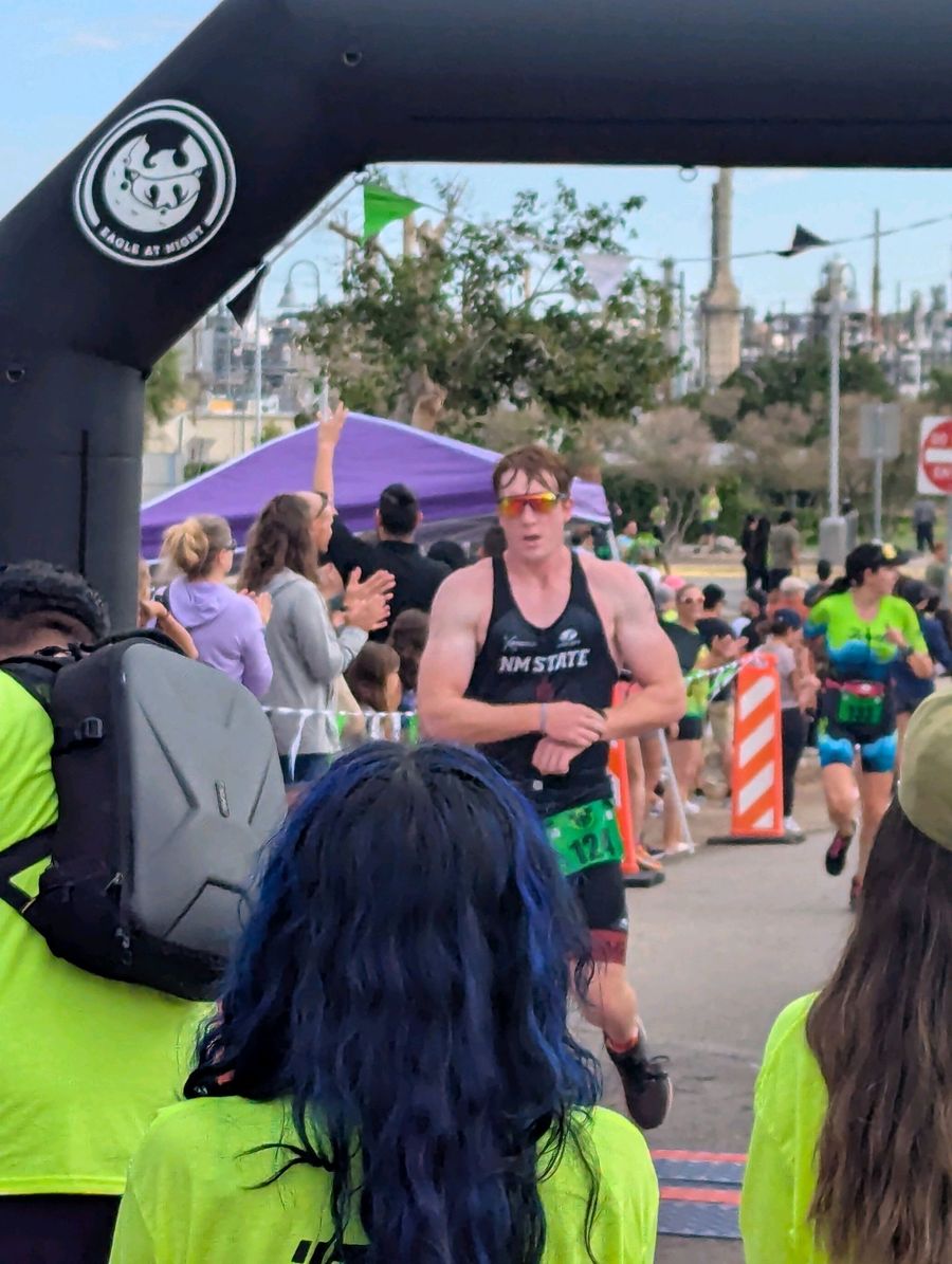 Colin finishing the run at Eagle in the Sun Triathlon in El Paso, TX